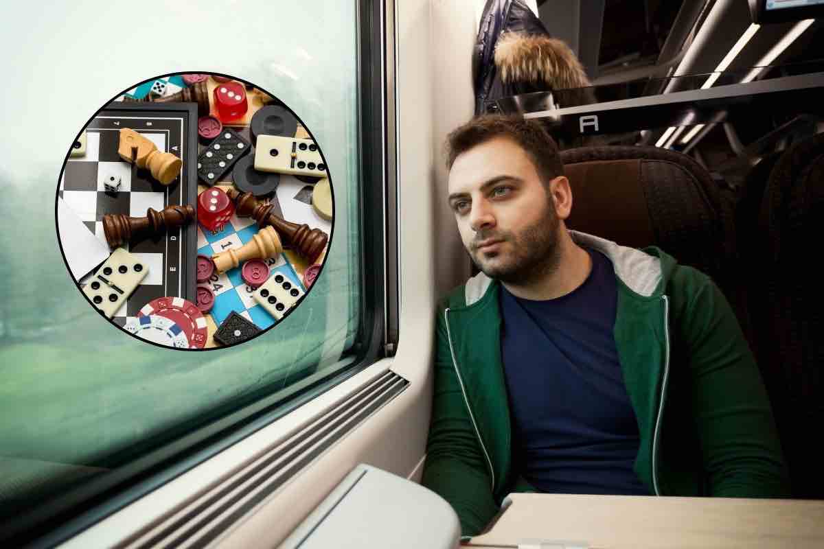 Uomo in treno e giochi da tavola